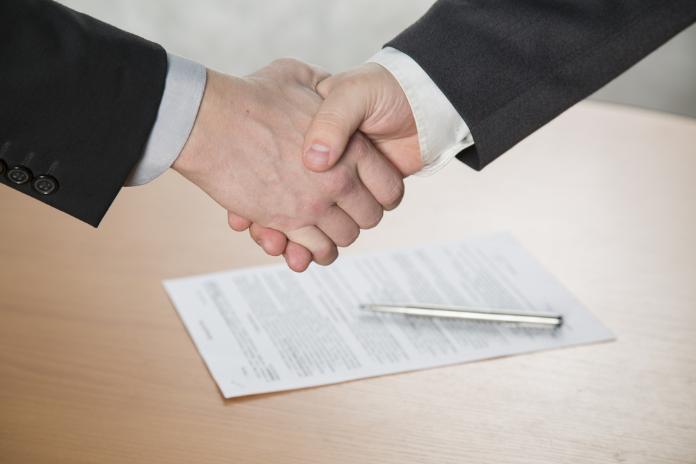 contract shaking hands.jpg